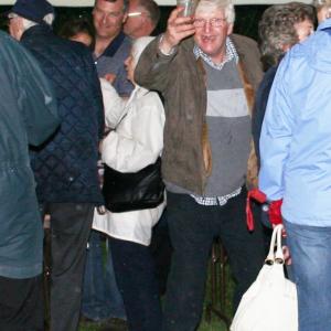 Edders raising his glass